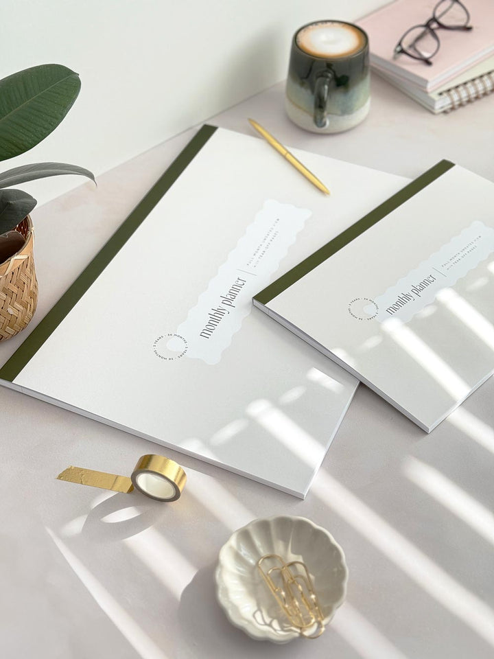 large a3 undated monthly planner with cover on desk with aesthetic stationery accessories