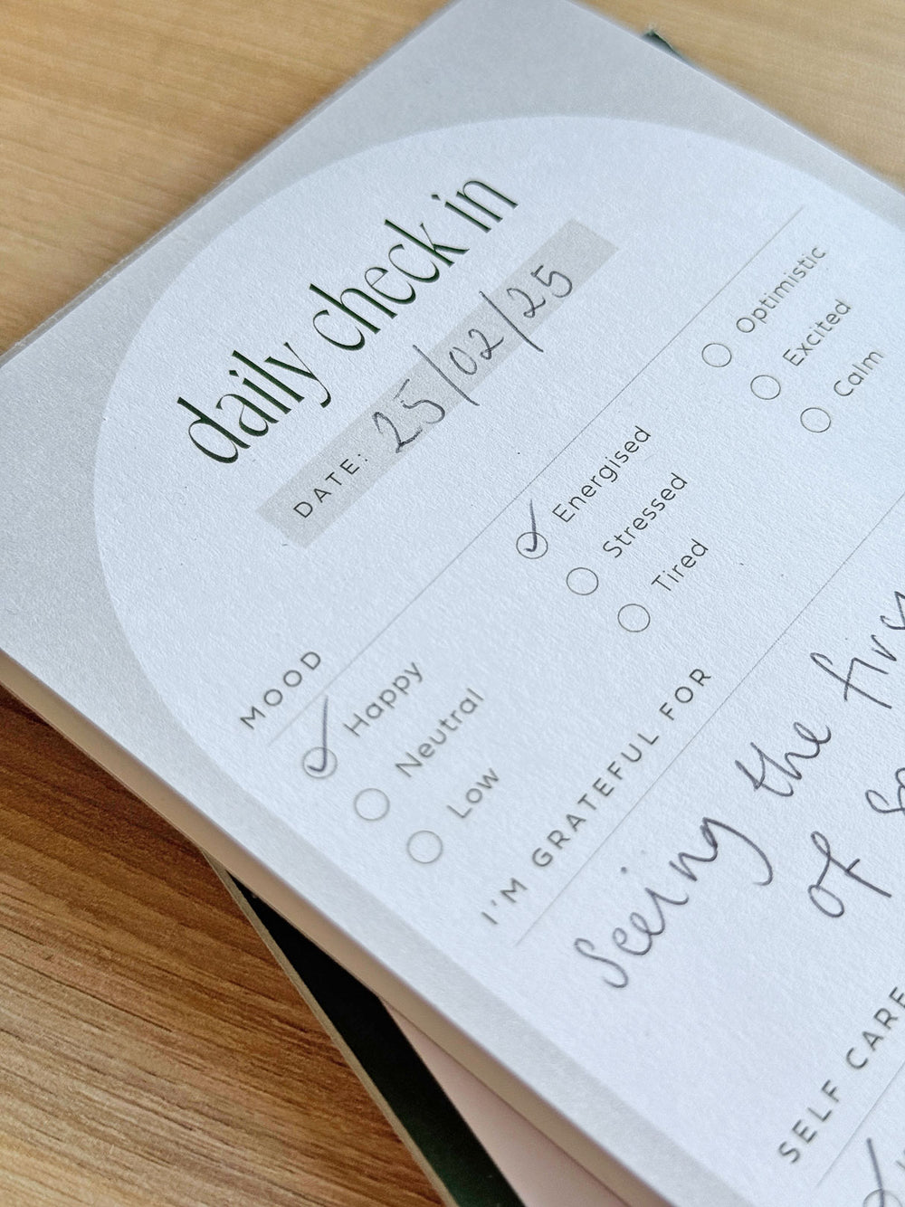 small notepad for mindfulness and gratitude with mood tracker