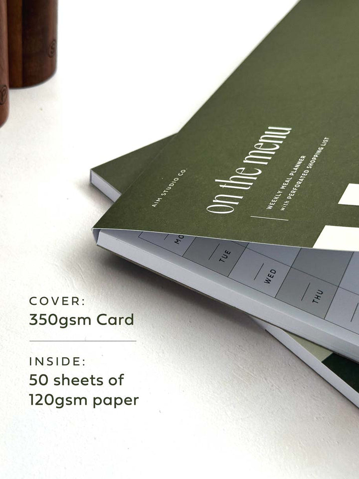 close up of notepad with cover showing paper thickness details.