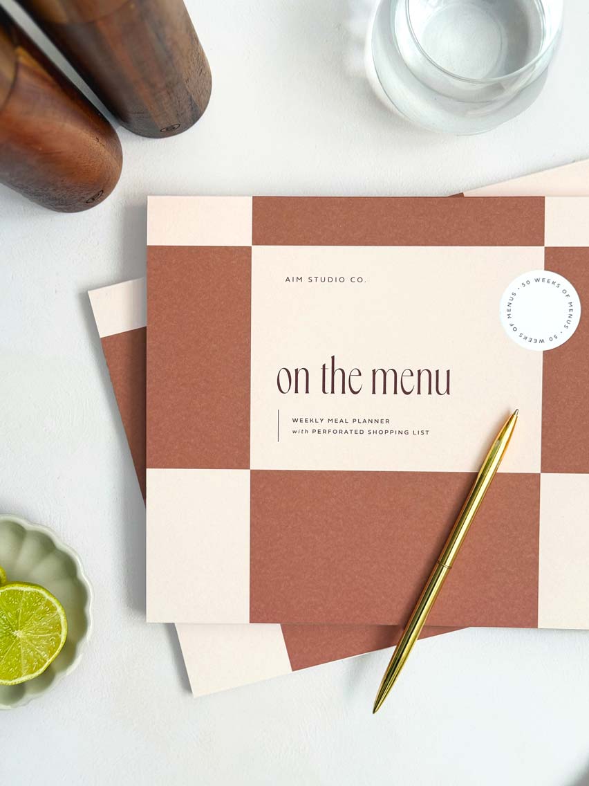 checkered planner pad with "on the menu" on the cover