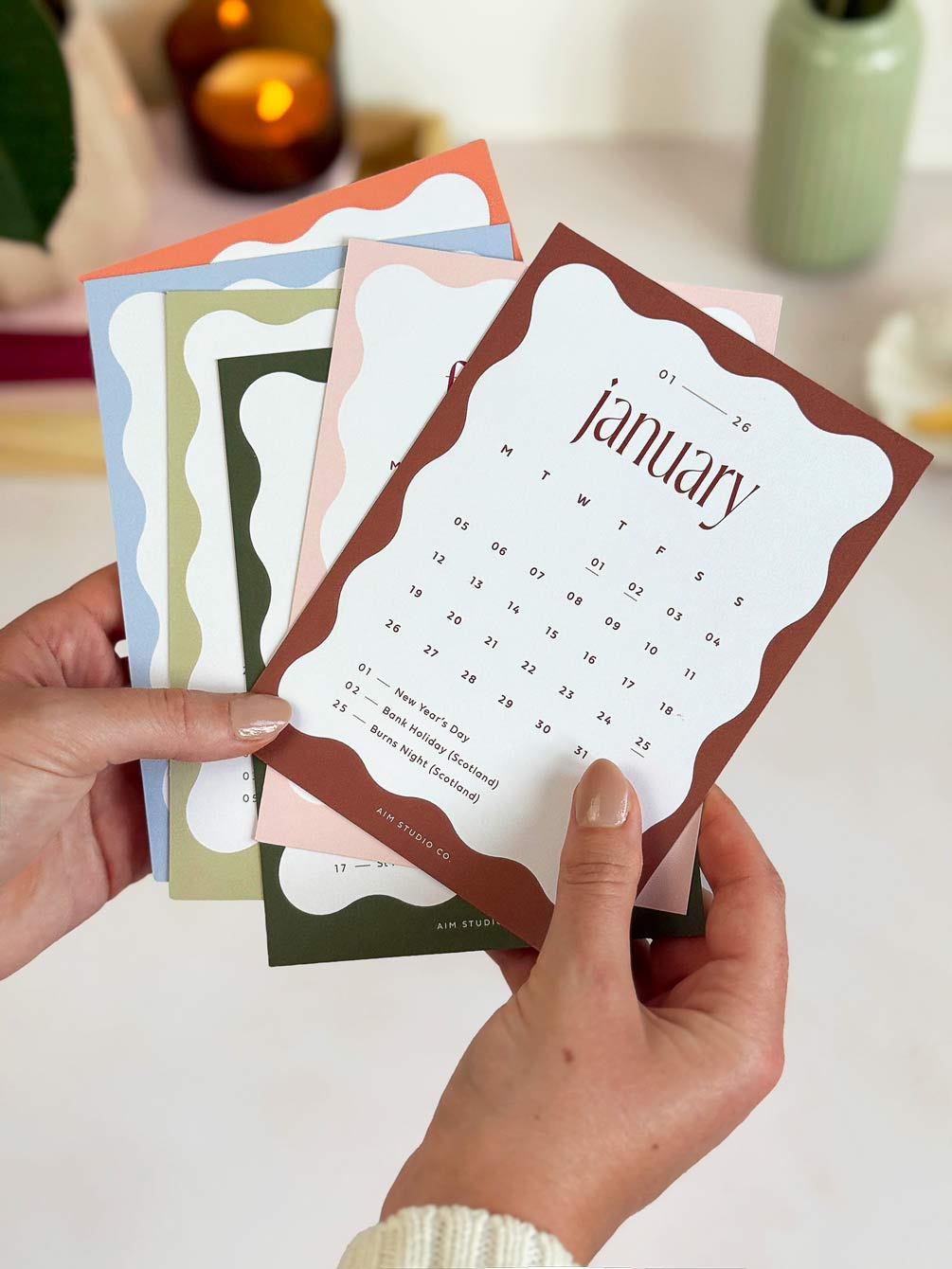 small 2026 calendar cards showing UK bank holidays with a wavy colour block border