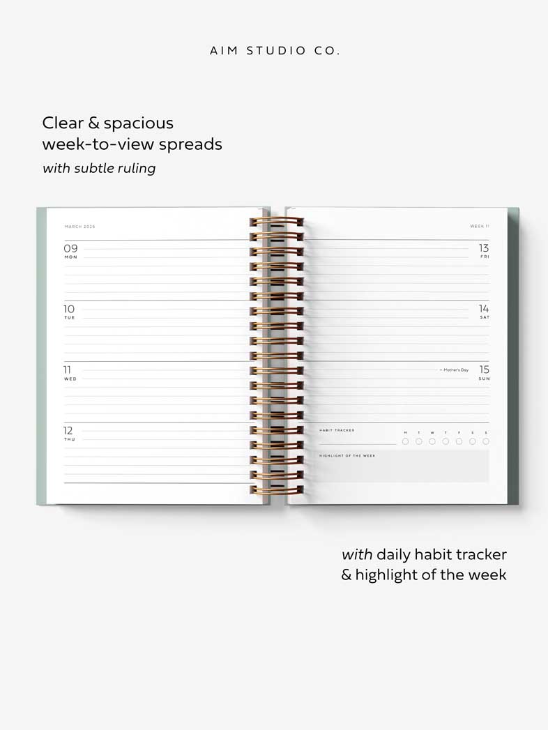 Open A5 planner showing weekly layout with UK bank holidays, daily habit tracker and highlight of the week feature.