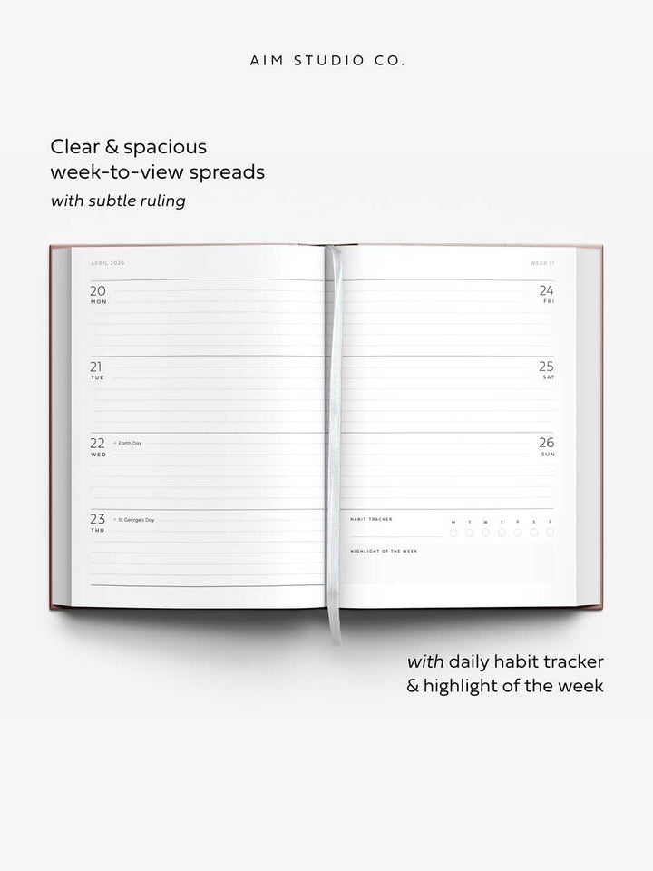 Open 2026 hardback planner showing weekly layout with Uk bank holidays, daily habit tracker and highlight of the week feature.