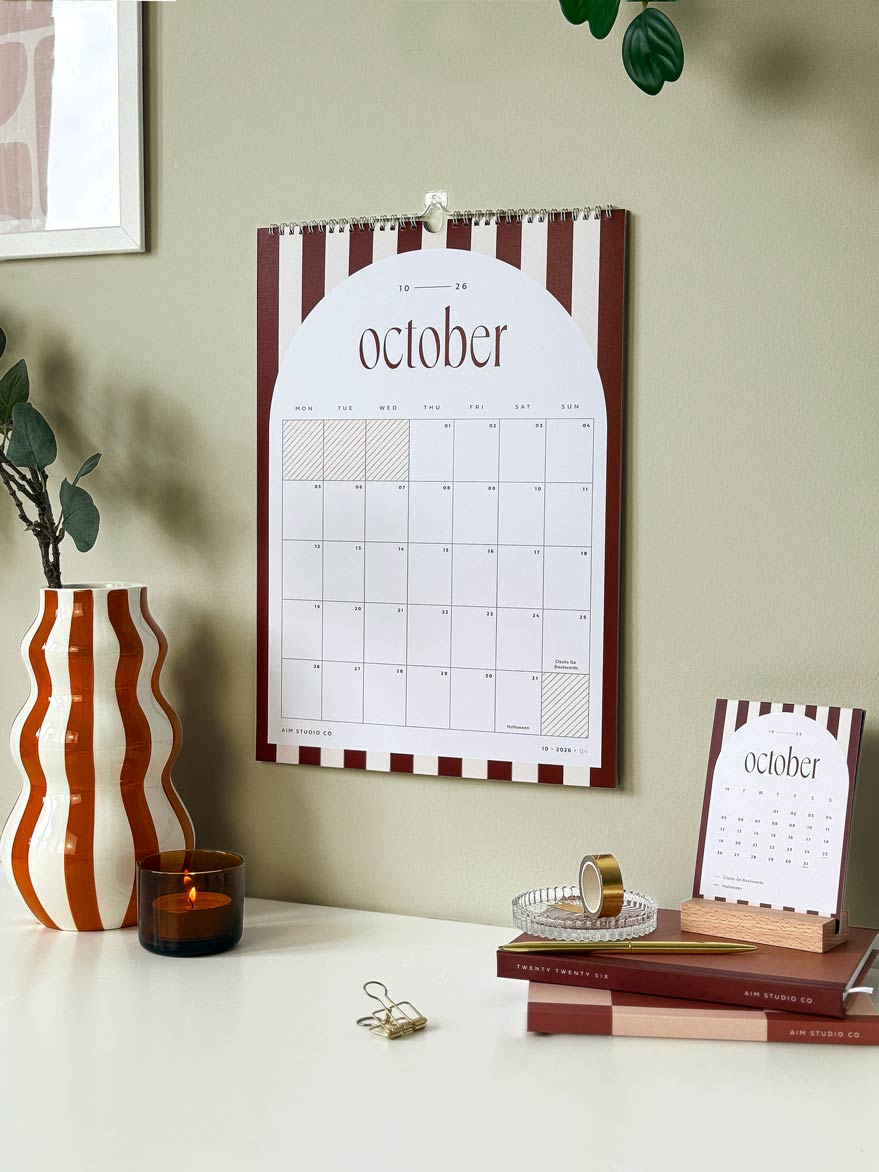 large Wall calendar for October 2026 on an office desk with aesthetic stationery items
