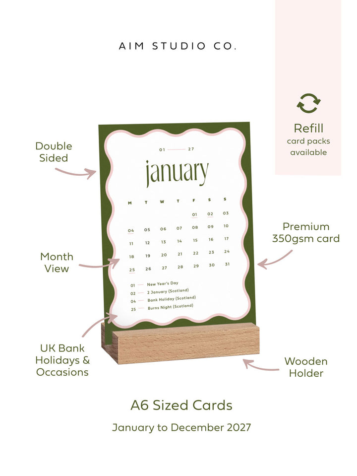 small 2027 desk calendar with wood holder by aim studio co with highlighted information reading double sided cards, printed on premium 350gsm card, month view format from January to December 2027 on A6 sized cards. A banner reads "refill card packs available".