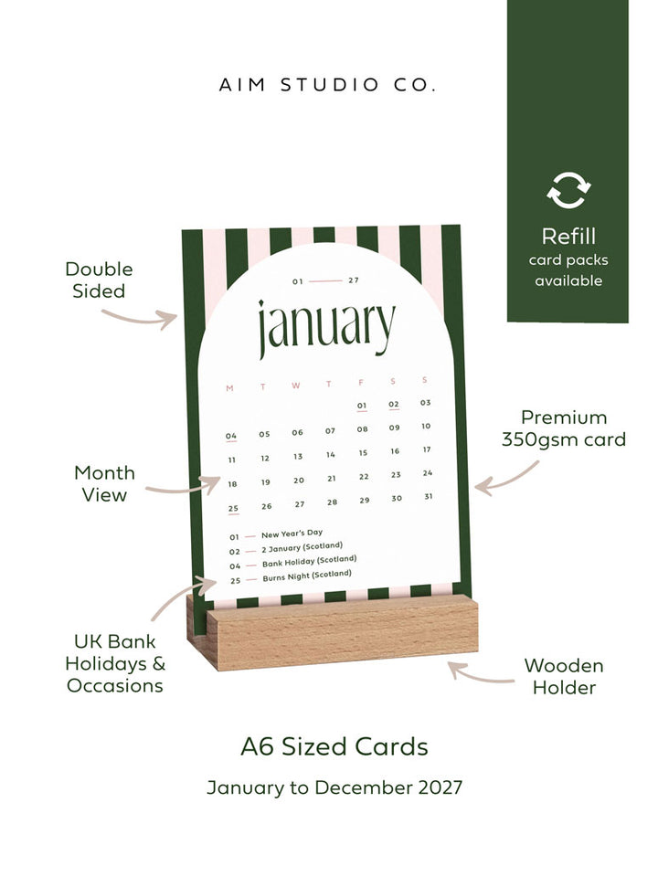Desk calendar by aim studio co with highlighted information such as month view, UK bank holidays, premium 350gsm card and wooden holder. The calendar includes 12 months from January to December 2027 and displayed in a wooden holder.