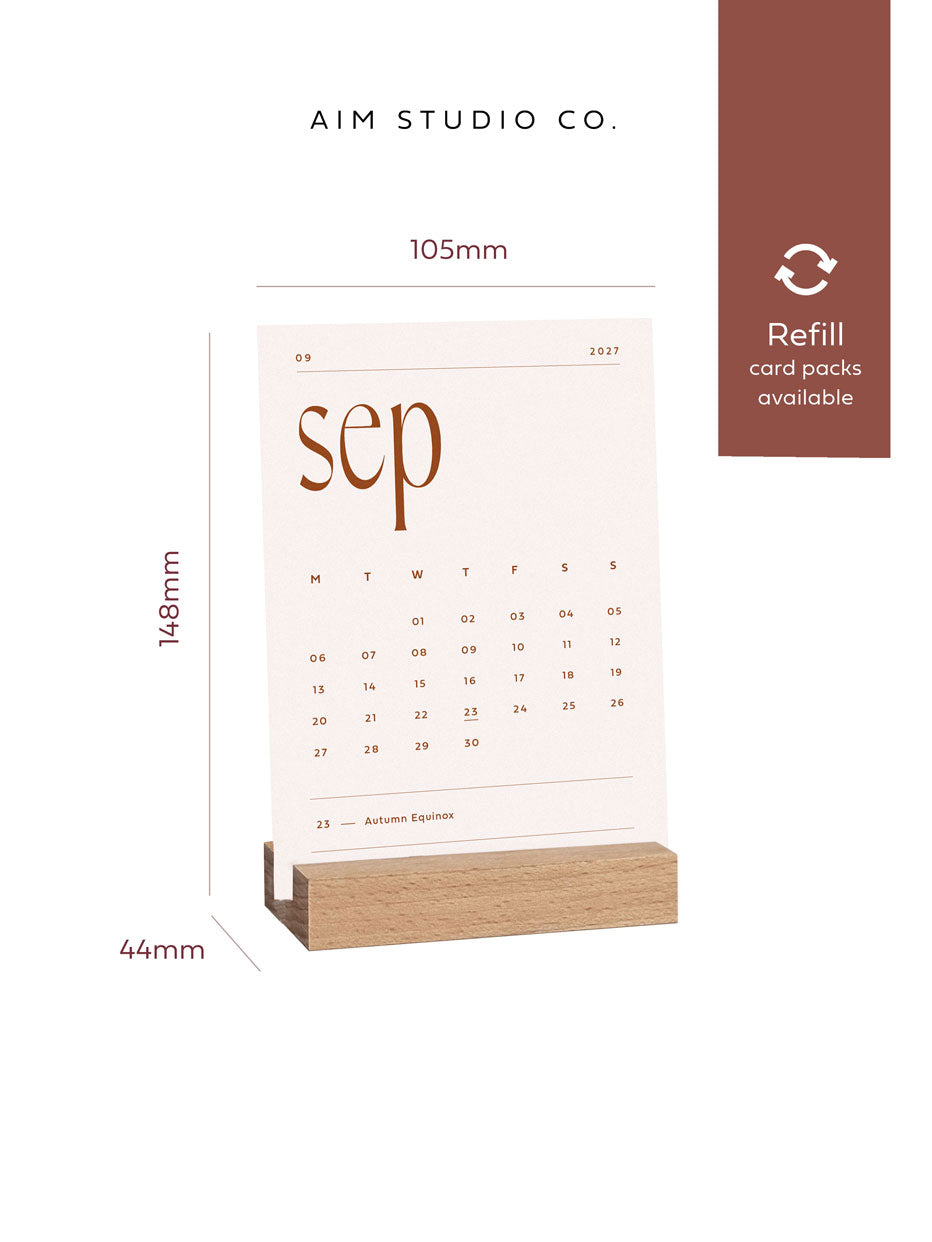 small desktop calendar with wooden stand by aim studio co with size dimenions for a6 month to view cards showing 105mm wide x 158mm in height.