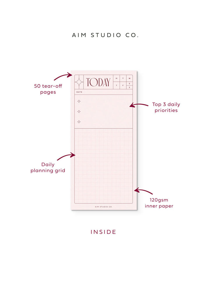 Inside pages of daily task planner showing pale pink paper with deep red text. Text with arrows highlights the 120gsm paper, top 3 priorities section, daily planning grid and 50 tear-off pages.