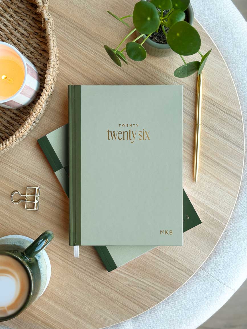 sage green. 2026 weekly diary with gold foiled personalised monogram on the cover