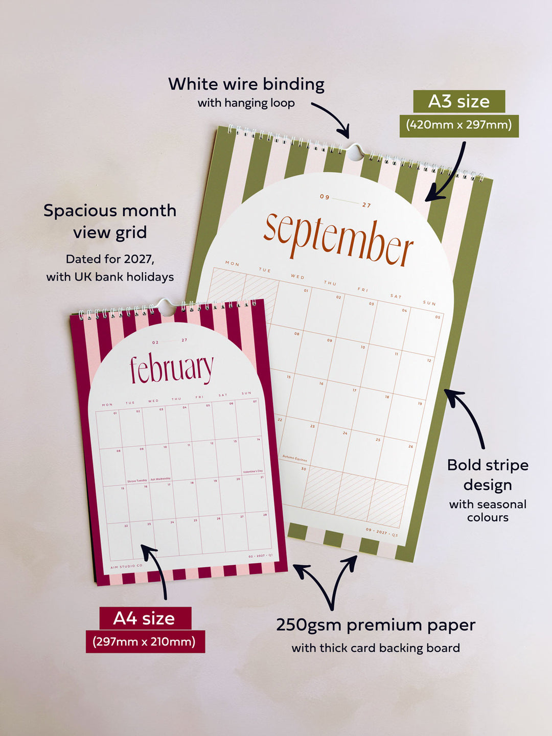 a large a3 monthly wall planner showing the month of September 2027 along with a smaller a4 calendar showing february. Both calendars feature white spiral binging with a hanging loop and a bold stripe design with contrasting arch and spacious planner grid with UK bank holidays marked.