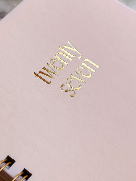 close up of 2027 weekly planner showing hot foil embossed &