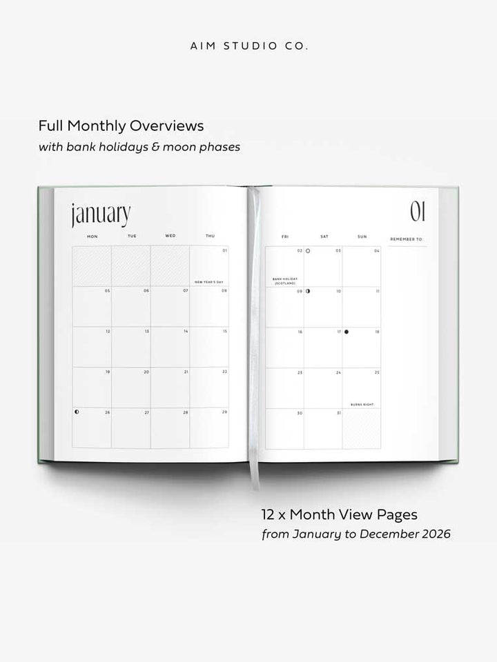 Open 2026 planner showing monthly calendar overview pages with UK bank holidays and moon phases.