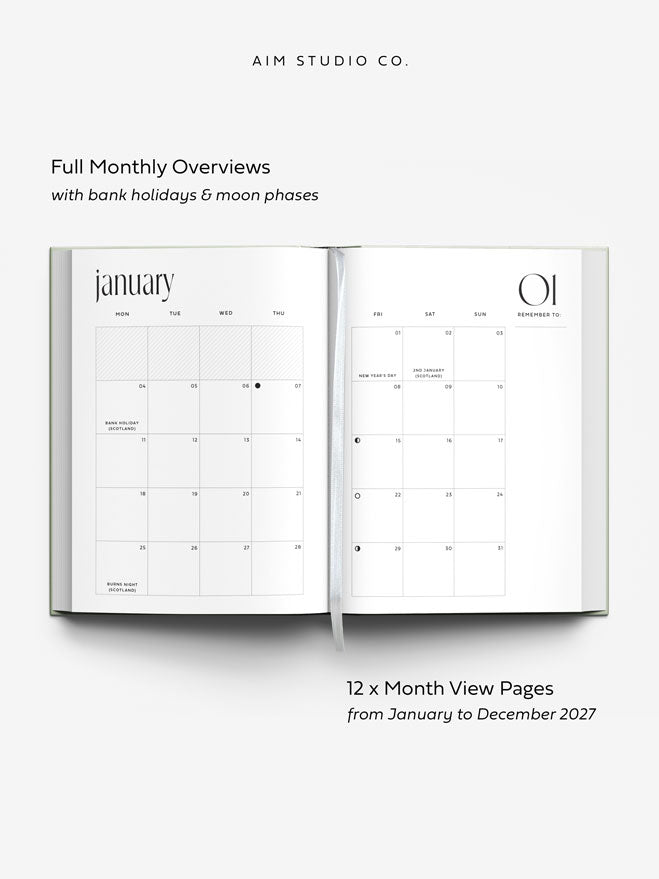 Open 2027 diary showing double page A5 monthly calendar spread of January, with UK bank holidays, moon phases and notes section. Text reads " full monthly overviews" and "12 x month view pages"