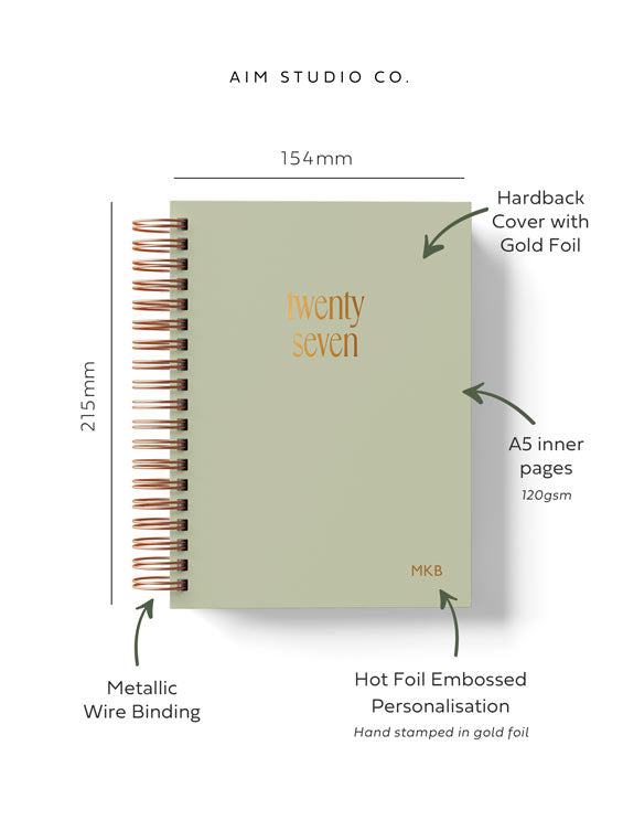 A product dimension diagram of an A5 spiral diary from Aim Studio Co. The planner has a sage green hardback cover with gold foil text reading &