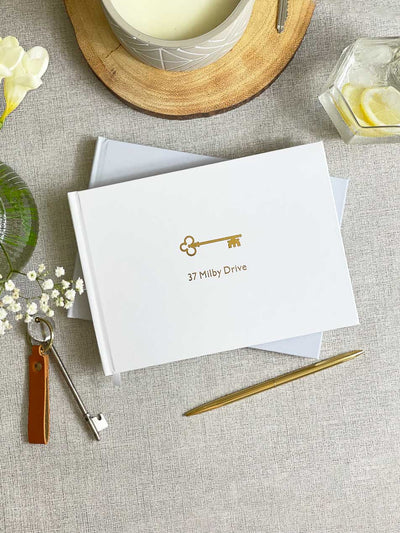 personalised first home book with gold foiled details on the cover